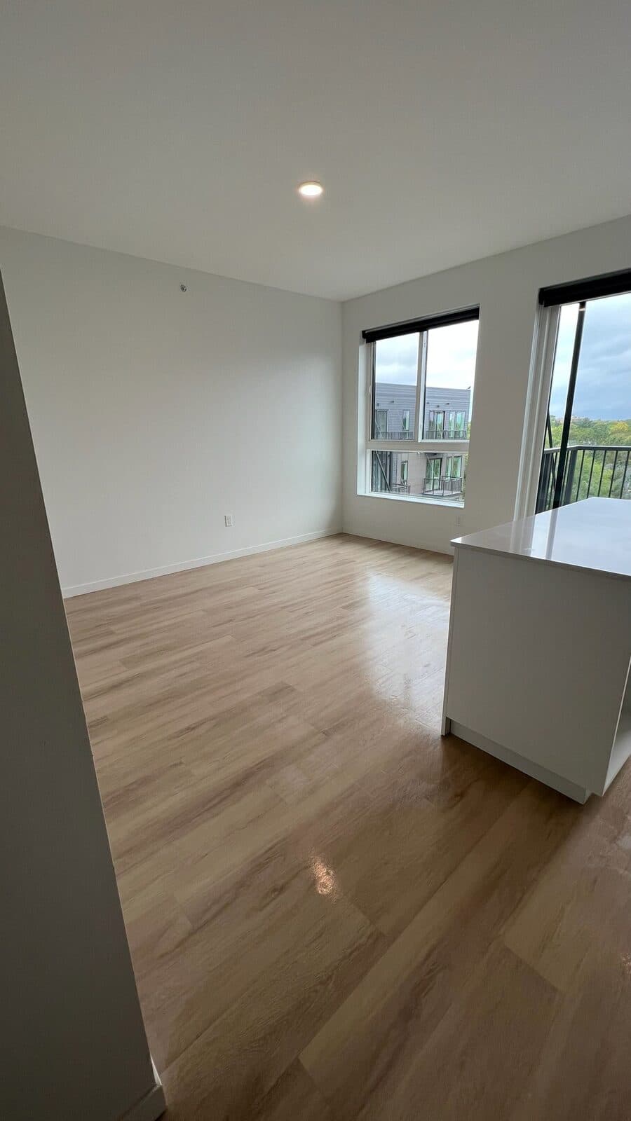 A spotless living room and floors after a post-construction clean